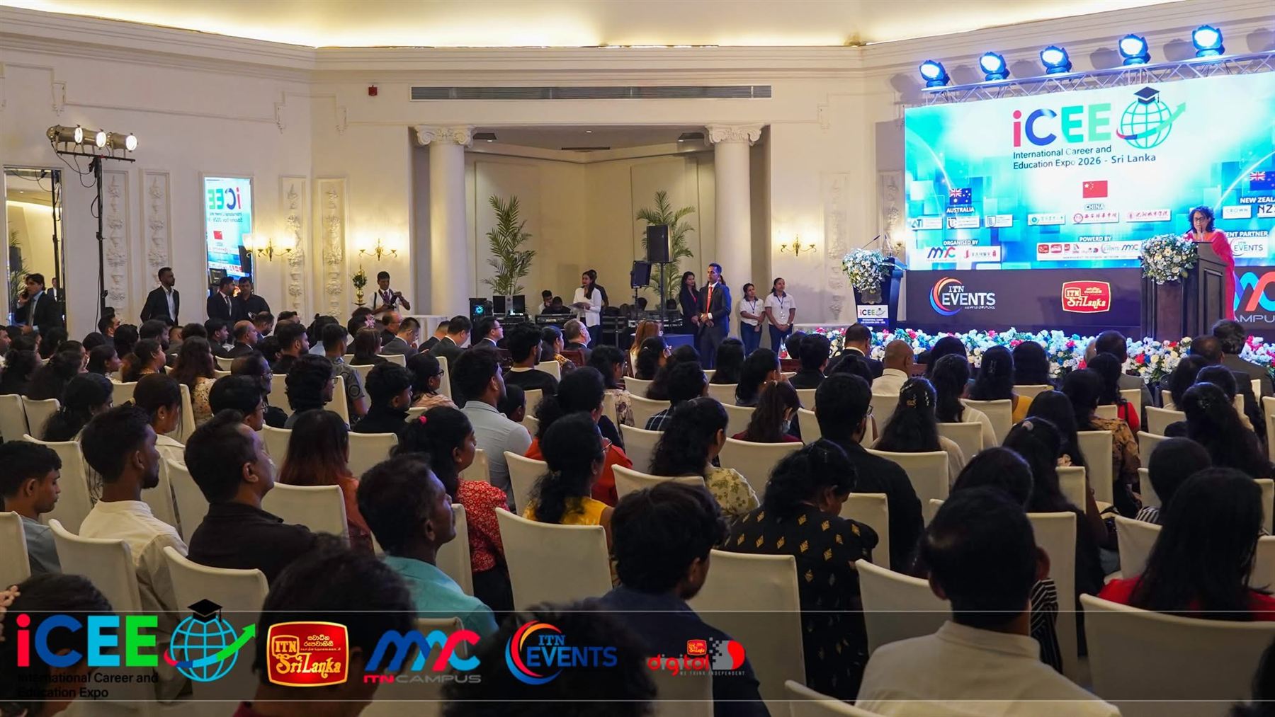 The Prime Minister addresses a full ballroom.